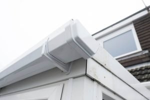 Photo of a white gutter on a house
