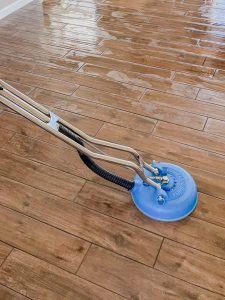 Photo of a tile and grout machine cleaning a floor